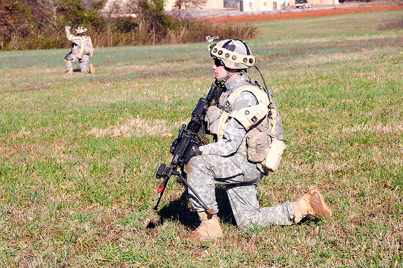 Spc. Anthony Euganeo, a rifleman with Company D, 1st Battalion, 502nd Infantry Regiment, 2nd Brigade Combat Team, 101st Airborne Division (Air Assault) pulls security during a patrol to a key leadership engagement during Strike Blitz training at Fort Campbell, Dec. 1st, 2011. Strike Blitz trains Soldiers on the real-life combat situations they can expect to see on deployment. Spc. Anthony Euganeo, a rifleman with Company D, 1st Battalion, 502nd Infantry Regiment, 2nd Brigade Combat Team, 101st Airborne Division (Air Assault) pulls security during a patrol to a key leadership engagement during Strike Blitz training at Fort Campbell, Dec. 1st, 2011. Strike Blitz trains Soldiers on the real-life combat situations they can expect to see on deployment.