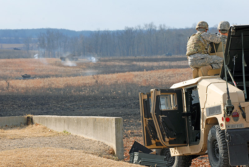 Soldiers assigned to the 3rd Brigade Combat Team "Rakkasans," 101st Airborne Division engage targets from atop a tactical vehicle with a MK 19 grenade machine gun Nov. 26 at Fort Campbell, Ky. The range gives Soldiers the opportunity to familiarize themselves with the weapon system for Individual Readiness Training in preparation for a deployment to Afghanistan. (U.S. Army photo taken by Sgt. Alan Graziano, 3rd Brigade Combat Team, 101st Airborne Division) Soldiers assigned to the 3rd Brigade Combat Team "Rakkasans," 101st Airborne Division engage targets from atop a tactical vehicle with a MK 19 grenade machine gun Nov. 26 at Fort Campbell, Ky. The range gives Soldiers the opportunity to familiarize themselves with the weapon system for Individual Readiness Training in preparation for a deployment to Afghanistan. (U.S. Army photo taken by Sgt. Alan Graziano, 3rd Brigade Combat Team, 101st Airborne Division)