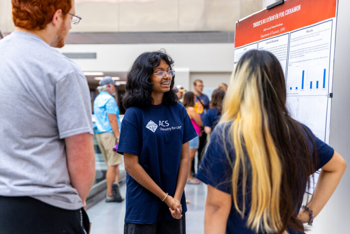 Tharushi Manathunga and Lilith Loera present their research on cinnamon during a five-day camp hosted by Austin Peay STate University’s Department of Chemistry. The program was open to eighth-12th graders and gave students firsthand experience with lab equipment. (Sean McCully, APSU)