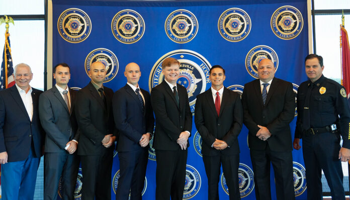 (L-R): Clarksville Mayor Joe Pitts, Antonio Becerra, Luis Fernandez, Jacob Gallo, Stephen Owens, Steven Reynoso, Joseph Preski, and Clarksville Police Chief Ty Burdine.