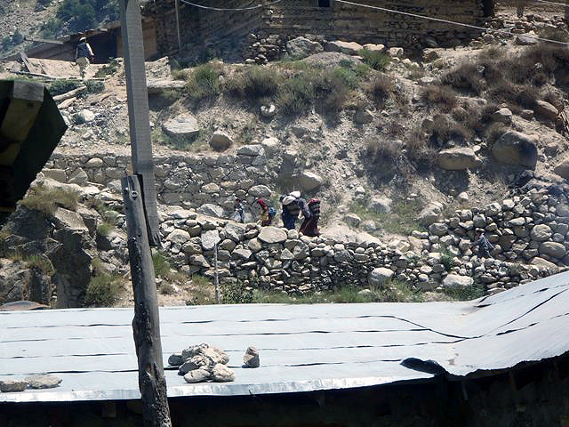 BARG-E MATAL, Afghanistan – Villagers return to the village of Barg-e Matal following the arrival of the Government of the Islamic Republic of Afghanistan forces July 26th. (Photo courtesy of U.S. Army) BARG-E MATAL, Afghanistan – Villagers return to the village of Barg-e Matal following the arrival of the Government of the Islamic Republic of Afghanistan forces July 26th. (Photo courtesy of U.S. Army)