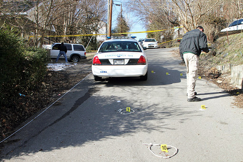 Officers Processing the Crime scene. (Photo by CPD-Jim Knoll) Officers Processing the Crime scene. (Photo by CPD-Jim Knoll)