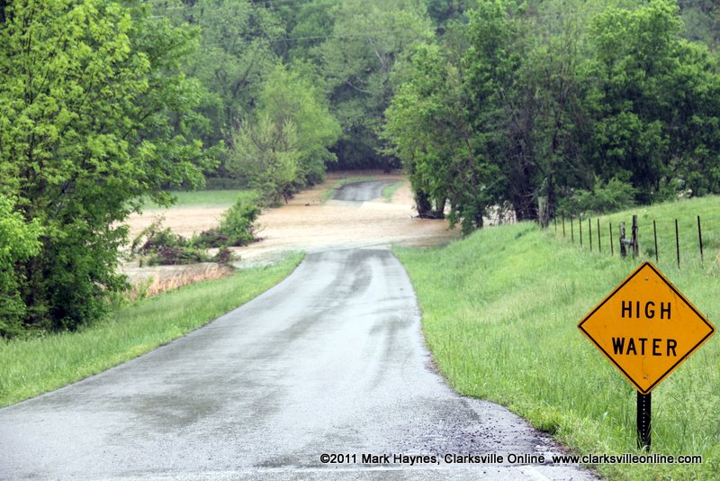 Water flowing over Powers PL which is off of Taurus road. Water flowing over Powers PL which is off of Taurus road.