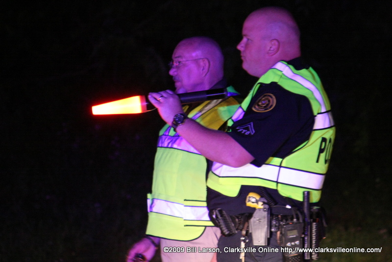 A representative of the Governor's Highway Safety Office stands with a Clarksville PD officer. A representative of the Governor's Highway Safety Office stands with a Clarksville PD officer.