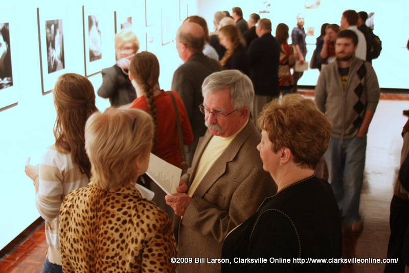 The crowd gets a first look at the donated art The crowd gets a first look at the donated art