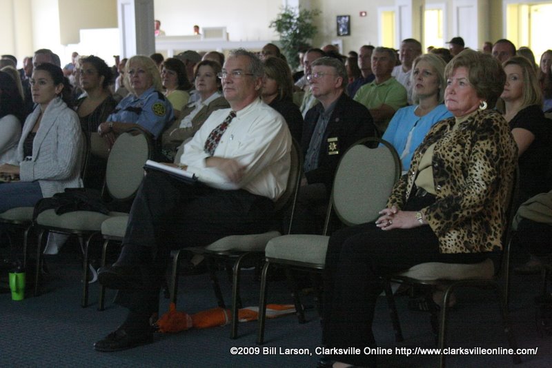 The crowd watches one of the mini-documentaries about the Extreme Makeover Home Edition program The crowd watches one of the mini-documentaries about the Extreme Makeover Home Edition program