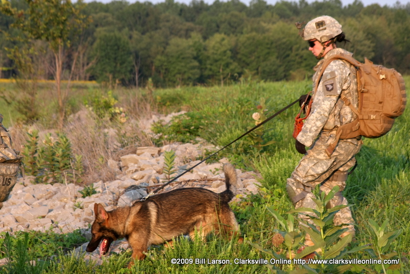 One of the canine units and the handler SPC Cutshall One of the canine units and the handler SPC Cutshall