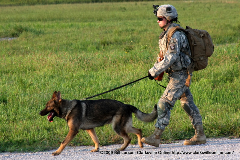 One of the canine units and the handler SPC Cutshall One of the canine units and the handler SPC Cutshall