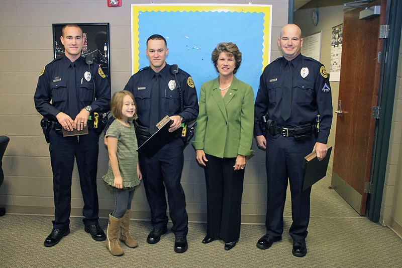 Mayor McMillan with award recipients and Officer Danault’s daughter, Bella. (Photo by CPD-Jim Knoll) Mayor McMillan with award recipients and Officer Danault’s daughter, Bella. (Photo by CPD-Jim Knoll)
