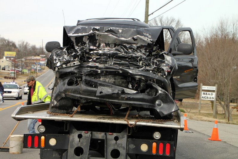 Dodge Durango being removed from the scene. (Photo by CPD-Jim Knoll) Dodge Durango being removed from the scene. (Photo by CPD-Jim Knoll)