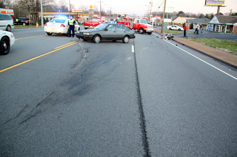1987 Chevy Nova turned in front of an oncoming 2008 Harley Motorcycle on Madison Street. (Photo by CPD-Jim Knoll) 1987 Chevy Nova turned in front of an oncoming 2008 Harley Motorcycle on Madison Street. (Photo by CPD-Jim Knoll)
