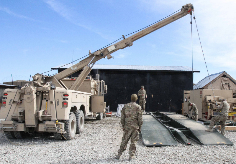 Soldiers assigned to Company E, 1st Battalion, 187th Infantry Regiment, 3rd Brigade Combat Team "Rakkasans,” 101st Airborne Division (Air Assault), work to move a collapsible bridge system in preparation for transport on Forward Operating Base Gardez, Afghanistan, Jan. 24, 2013. The bridge system may be requested at any time and Soldiers are required to have it mission ready at a moment’s notice. (Spc. Brian Smith-Dutton/U.S. Army) Soldiers assigned to Company E, 1st Battalion, 187th Infantry Regiment, 3rd Brigade Combat Team "Rakkasans,” 101st Airborne Division (Air Assault), work to move a collapsible bridge system in preparation for transport on Forward Operating Base Gardez, Afghanistan, Jan. 24, 2013. The bridge system may be requested at any time and Soldiers are required to have it mission ready at a moment’s notice. (Spc. Brian Smith-Dutton/U.S. Army)