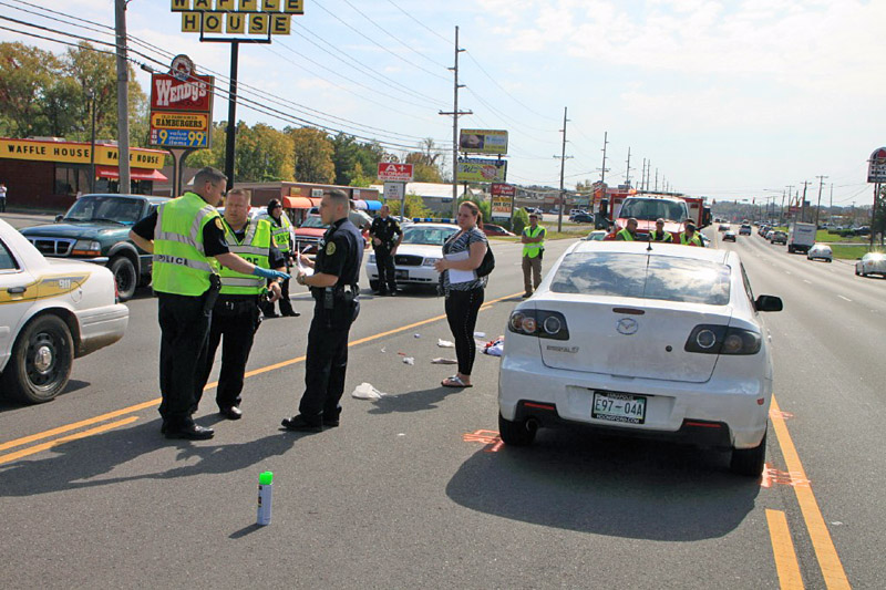 Mazda 3 that stuck and killed a pedestrian on Fort Campbell Boulevard Tuesday, October 16th. (Photo by CPD-Jim Knoll) Mazda 3 that stuck and killed a pedestrian on Fort Campbell Boulevard Tuesday, October 16th. (Photo by CPD-Jim Knoll)