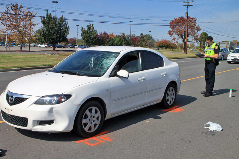 Mazda 3 that stuck and killed a pedestrian on Fort Campbell Boulevard Tuesday, October 16th. (Photo by CPD-Jim Knoll) Mazda 3 that stuck and killed a pedestrian on Fort Campbell Boulevard Tuesday, October 16th. (Photo by CPD-Jim Knoll)