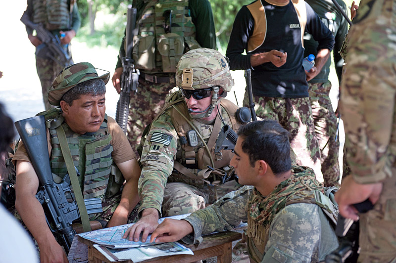 U.S. Army Capt. Nicholas Drake, commander, Security Forces Advisory and Assistance Team Archangel, 1st Brigade Combat Team, 101st Airborne Division, of Calabasas, Calif., confers with Afghan National Army Lt. Col. Mohammad Bashir, commander, 2nd Kandak, 4th Brigade, on the outskirts of the village of Takiya Khana, Bati Kot district, Nangarhar Province, Afghanistan, June 15, 2013. (U.S. Army photo by Sgt. Margaret Taylor, 129th Mobile Public Affairs Detachment) U.S. Army Capt. Nicholas Drake, commander, Security Forces Advisory and Assistance Team Archangel, 1st Brigade Combat Team, 101st Airborne Division, of Calabasas, Calif., confers with Afghan National Army Lt. Col. Mohammad Bashir, commander, 2nd Kandak, 4th Brigade, on the outskirts of the village of Takiya Khana, Bati Kot district, Nangarhar Province, Afghanistan, June 15, 2013. (U.S. Army photo by Sgt. Margaret Taylor, 129th Mobile Public Affairs Detachment)