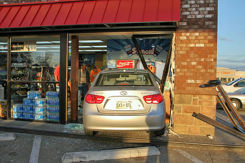 Brakes on the Hyundai Elantra fail and it crashed through the glass of the Shell Sudden Service on Wilma Rudolph Boulevard. (Photo by CPD-Jim Knoll) Brakes on the Hyundai Elantra fail and it crashed through the glass of the Shell Sudden Service on Wilma Rudolph Boulevard. (Photo by CPD-Jim Knoll)