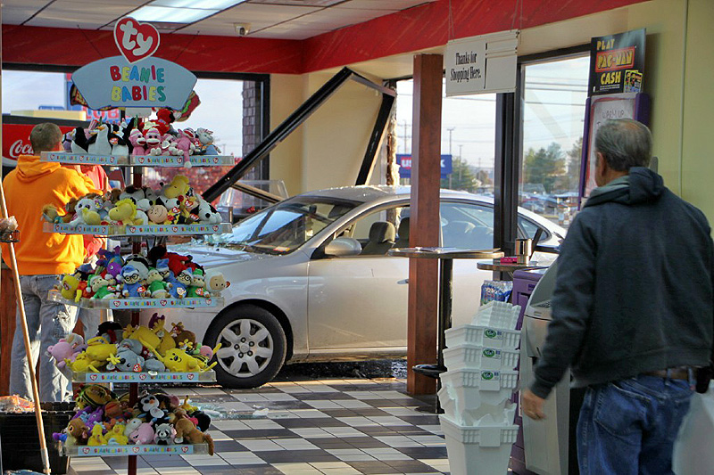 Brakes on the Hyundai Elantra fail and it crashed through the glass of the Shell Sudden Service on Wilma Rudolph Boulevard. (Photo by CPD-Jim Knoll) Brakes on the Hyundai Elantra fail and it crashed through the glass of the Shell Sudden Service on Wilma Rudolph Boulevard. (Photo by CPD-Jim Knoll)