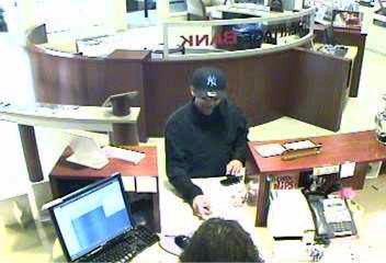 Heritage Bank photo of the Suspect. Heritage Bank photo of the Suspect.