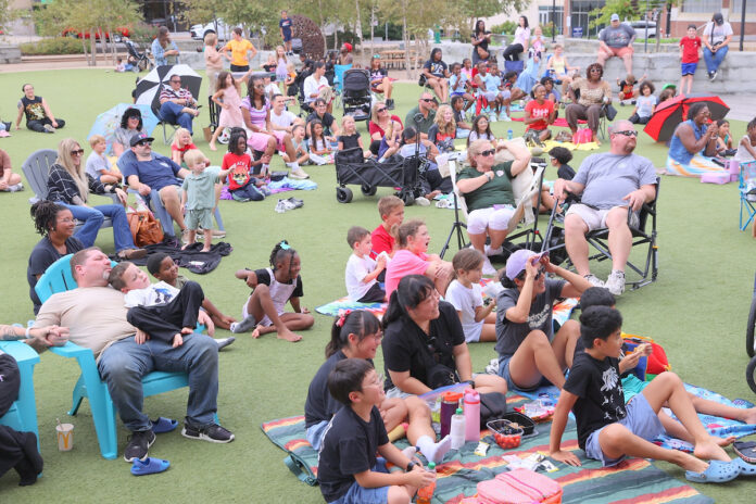 Families Gather in Downtown Clarksville for Terry Hedges’ Live Magic Show Hosted by the Public Library and Montgomery County Parks and Recreation. (Mark Haynes, Clarksville Online)