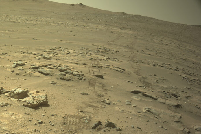 One of Perseverance’s navigation cameras captured this shot on October 11th, 2026, the Martian day, or sol, that a 299.6-foot (91.31-meter) drive pushed the rover’s total mileage past Opportunity’s 28.06-mile (45.16-kilometer) record on Mars. (NASA/JPL-Caltech)